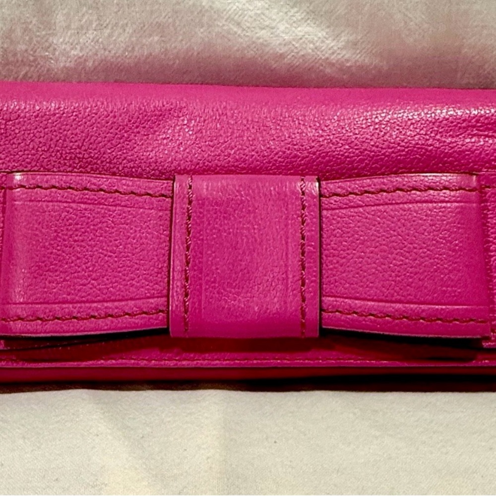 Kate Spade VGUC Bubblegum Pink
Leather VillabellaAve Mara Bow Wristlet
W/COA - Picture 3 of 12